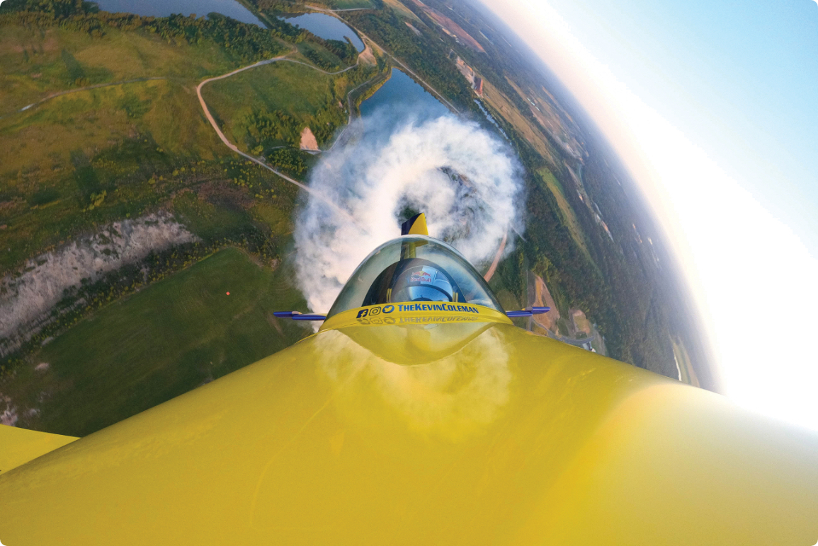 View of Kevin Coleman in cabin of aerobatic plane