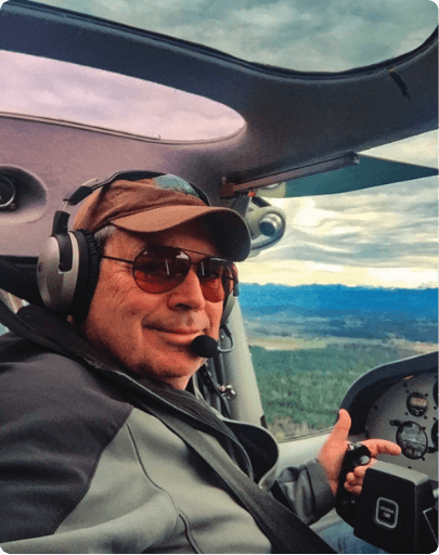 Mike Todd piloting aircraft